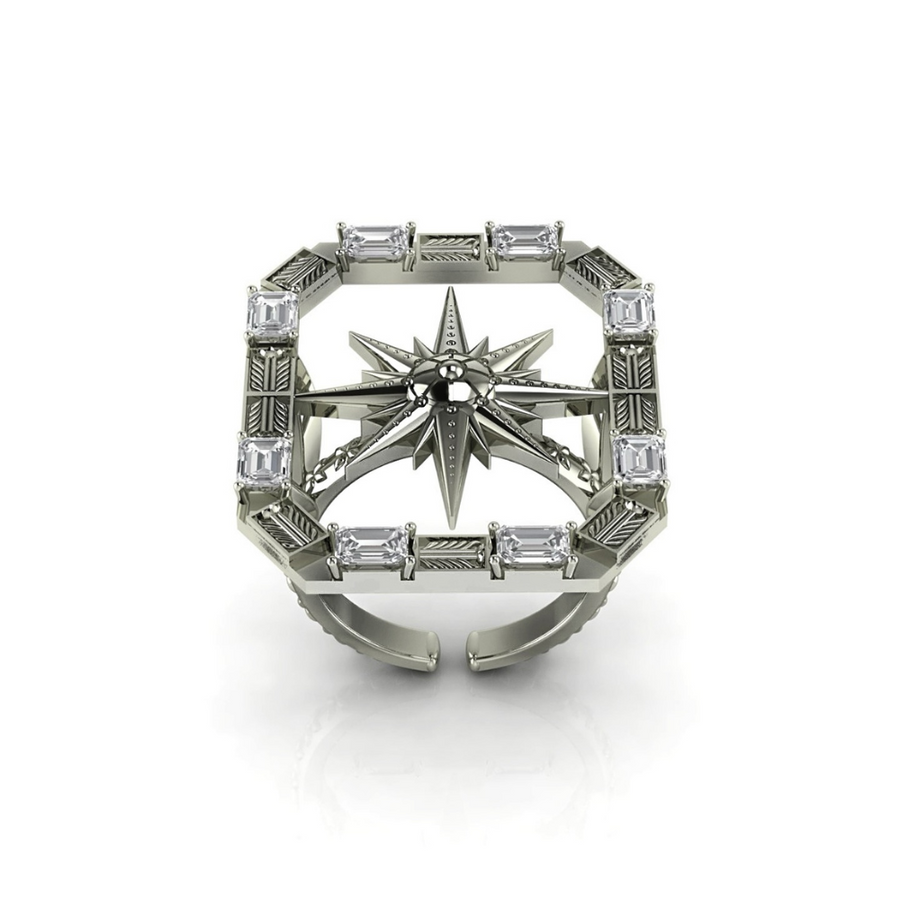 Silver ring with star design and diamond accents on a white background