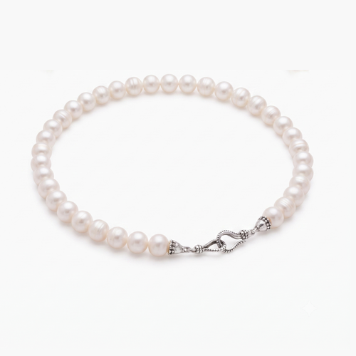 A strand of white freshwater pearls arranged in a circle with a silver-toned twisted rope clasp, shown on a clean white background.
