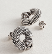 earrings with dots and stone